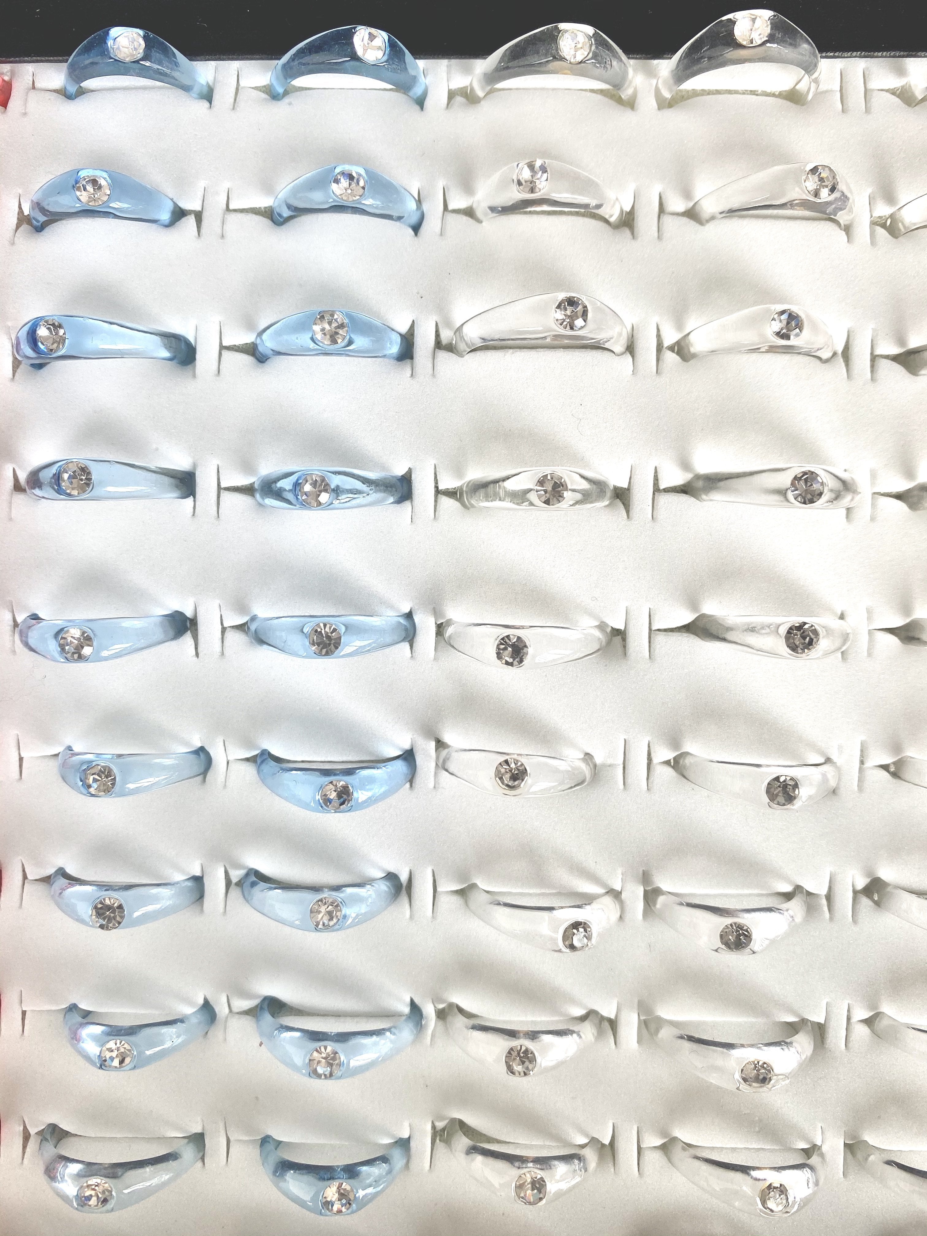 DESTOCKAGE Boîte de bagues fantaisie femme (x100) 0,50€/unité | Grossiste-pro