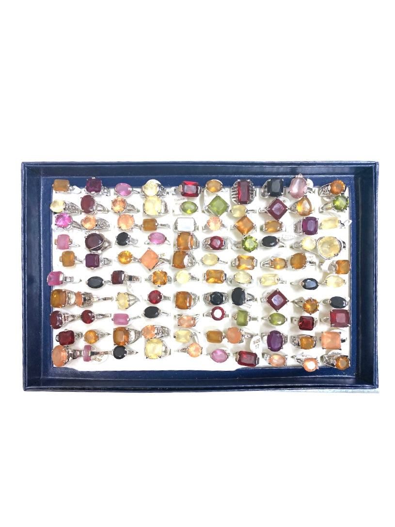 Boîte bagues fantaisie pierre précieuse (x100)